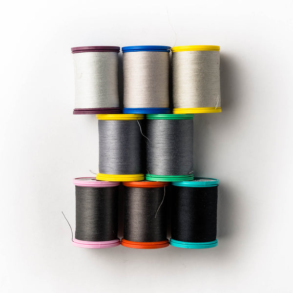 Sewing thread - grey + black shades